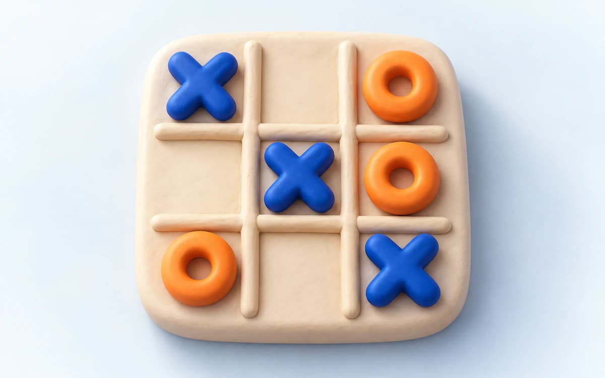 ภาพประกอบเกม OX กากบาทสีน้ำเงินและวงกลมสีส้มบนตาราง 3×3